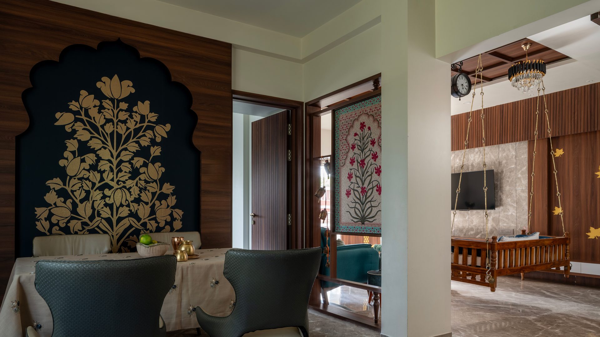 Indigo arched niche with a golden tree-of-life motif beside a carved wooden swing — Cultural Contours & Modern Minimalisms
